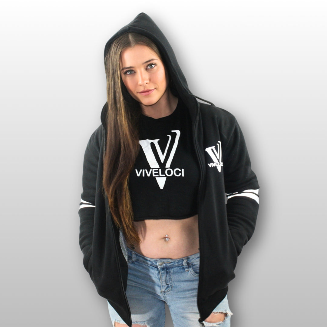 Tiffany is wearing a black ViVeloci Kevlar Lined, Armored, Motorcycle Hoodie. Reflective back, front and arm bands.  Removable CE Level 1 Armor in Shoulders, Elbows and Back. Two zippered pockets on the outside and one on the inside.