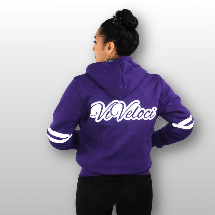 Lani is wearing a ViVeloci Kevlar Lined, Armored, Motorcycle Hoodie in Purple.  Reflective back, front and arm bands.  Removable CE Level 1 Armor in Shoulders, Elbows and Back. Two zippered pockets on the outside and one on the inside.