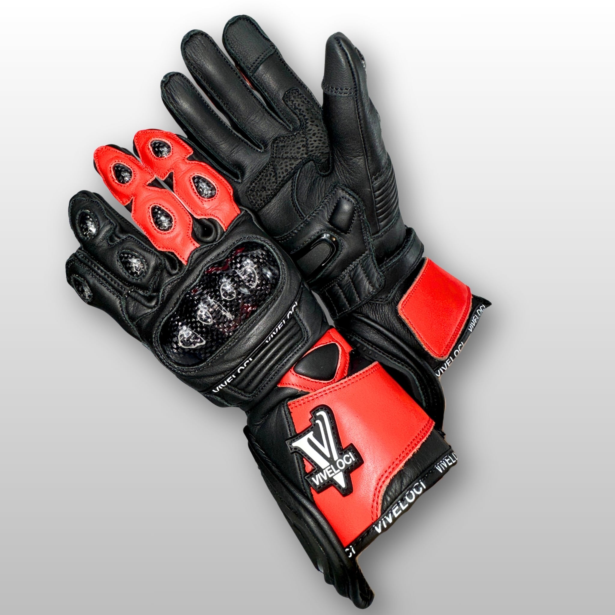 Carbon fiber knuckle armor on women’s leather motorcycle gauntlet gloves