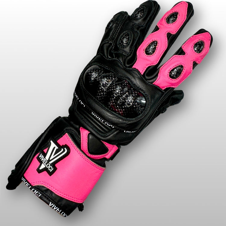 Carbon fiber knuckle armor on women’s pink and black leather full gauntlet motorcycle gloves