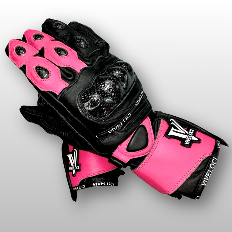 Carbon fiber knuckle armor on women’s pink and black leather full gauntlet motorcycle gloves