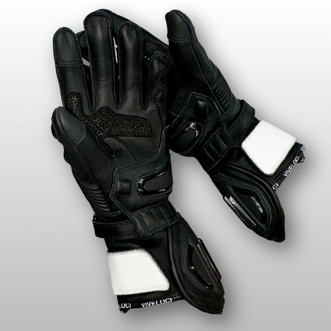 TPU palm sliders and reinforced leather palm on women’s white and black full gauntlet motorcycle gloves