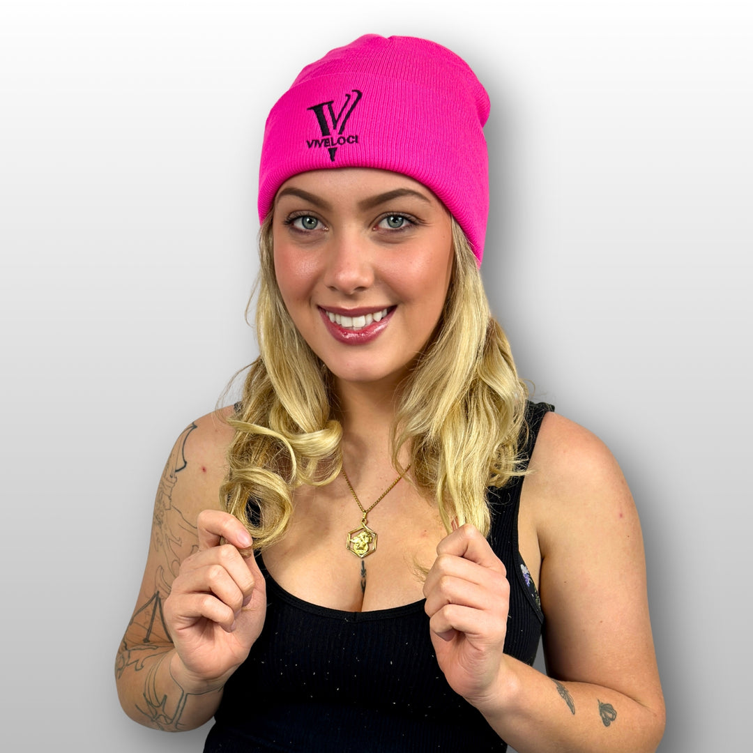 Bella wearing a pink Viveloci beanie 
