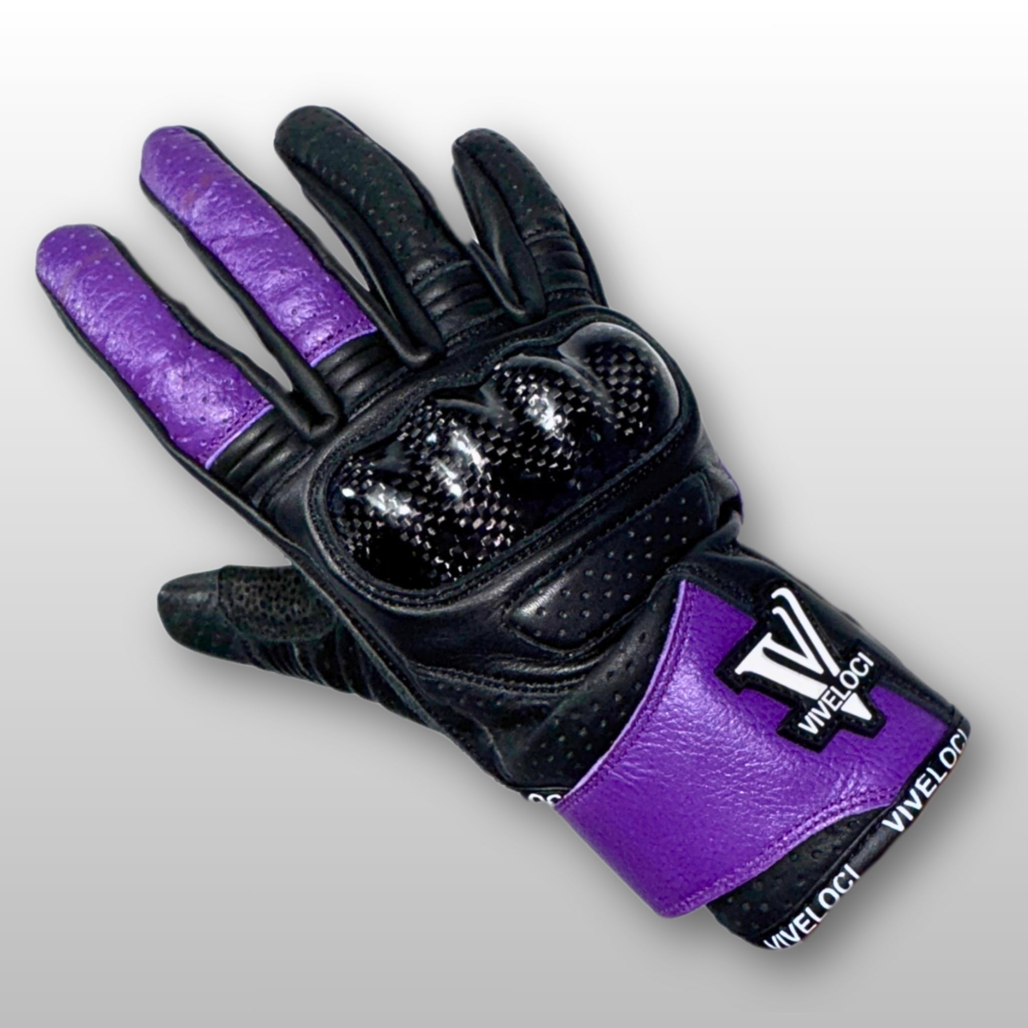 Women’s leather motorcycle gloves with carbon fiber knuckles in purple.