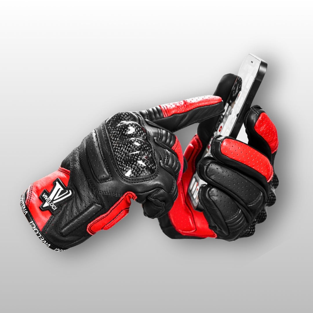 Black and Red Ciao Bella Motorcycle Gloves using phone's touchscreen