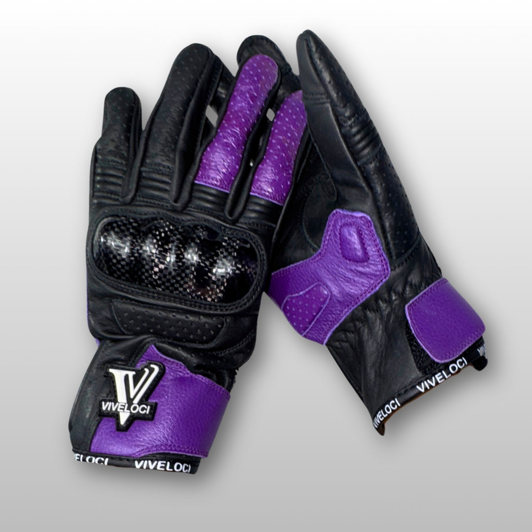 Women’s leather motorcycle gloves with carbon fiber knuckles in purple.