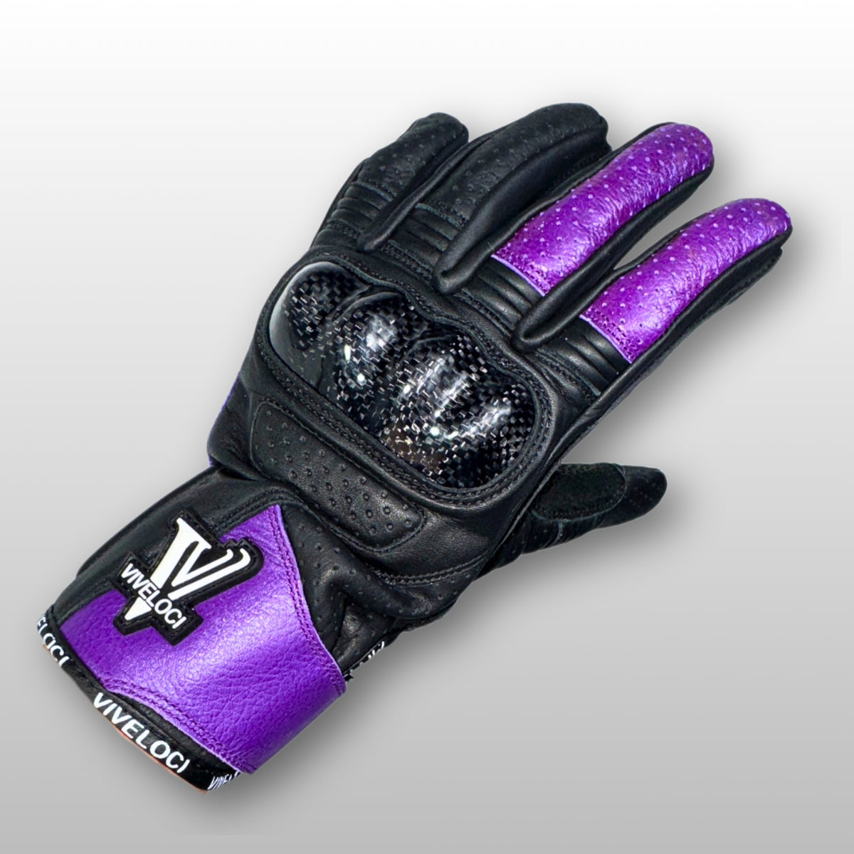 Women’s leather motorcycle gloves with carbon fiber knuckles in purple.