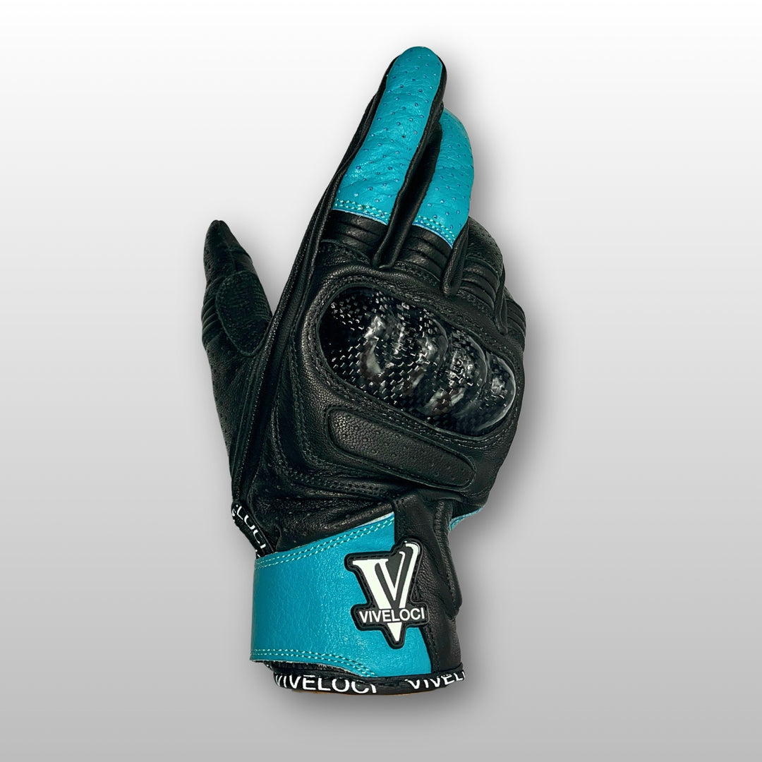 Women’s leather motorcycle gloves with carbon fiber knuckles in teal.