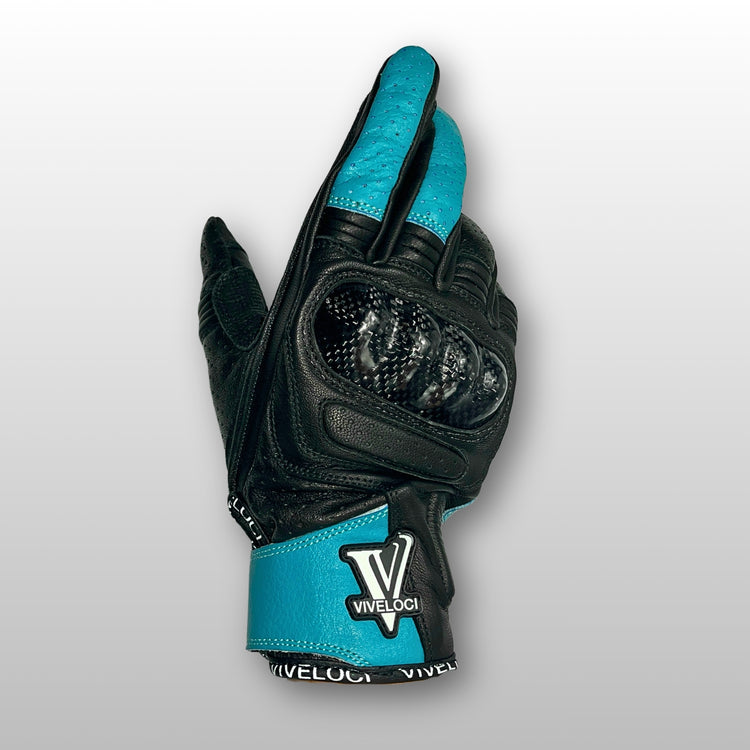 Women’s leather motorcycle gloves with carbon fiber knuckles in teal.