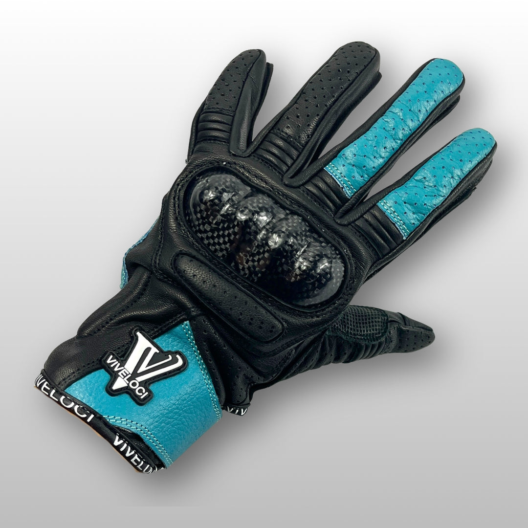 Women’s leather motorcycle gloves with carbon fiber knuckles in teal.