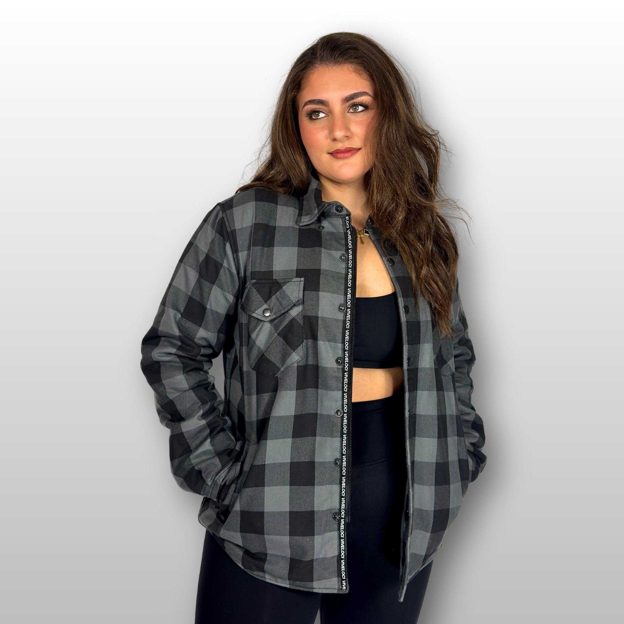 Bernadette wearing Viveloci Women's Grey and Black Kevlar Lined Armored Riding Flannel for women. Zipper and Snaps along front. Snaps on cuffs and collar