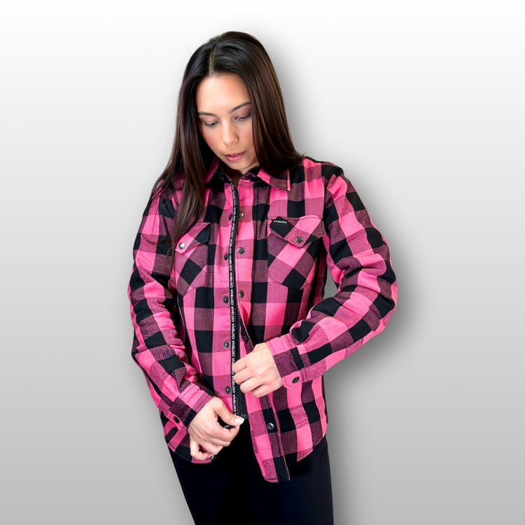 Julie wearing Viveloci Women's Pink and Black Kevlar Lined Armored Riding Flannel for women. Zipper and Snaps along front. Snaps on cuffs and collar