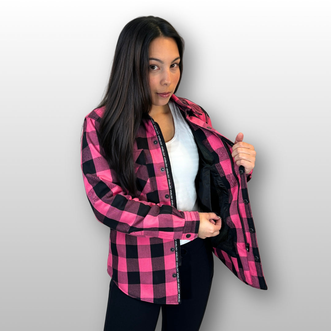 Julie wearing Viveloci Women's Pink and Black Kevlar Lined Armored Riding Flannel for women. Zipper and Snaps along front. Snaps on cuffs and collar