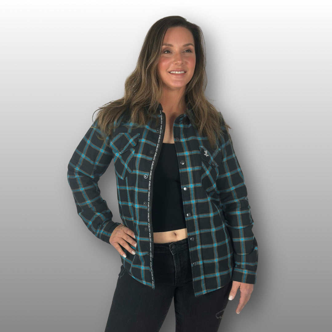 Deanna wearing teal and black Armored Riding Flannel unzipped