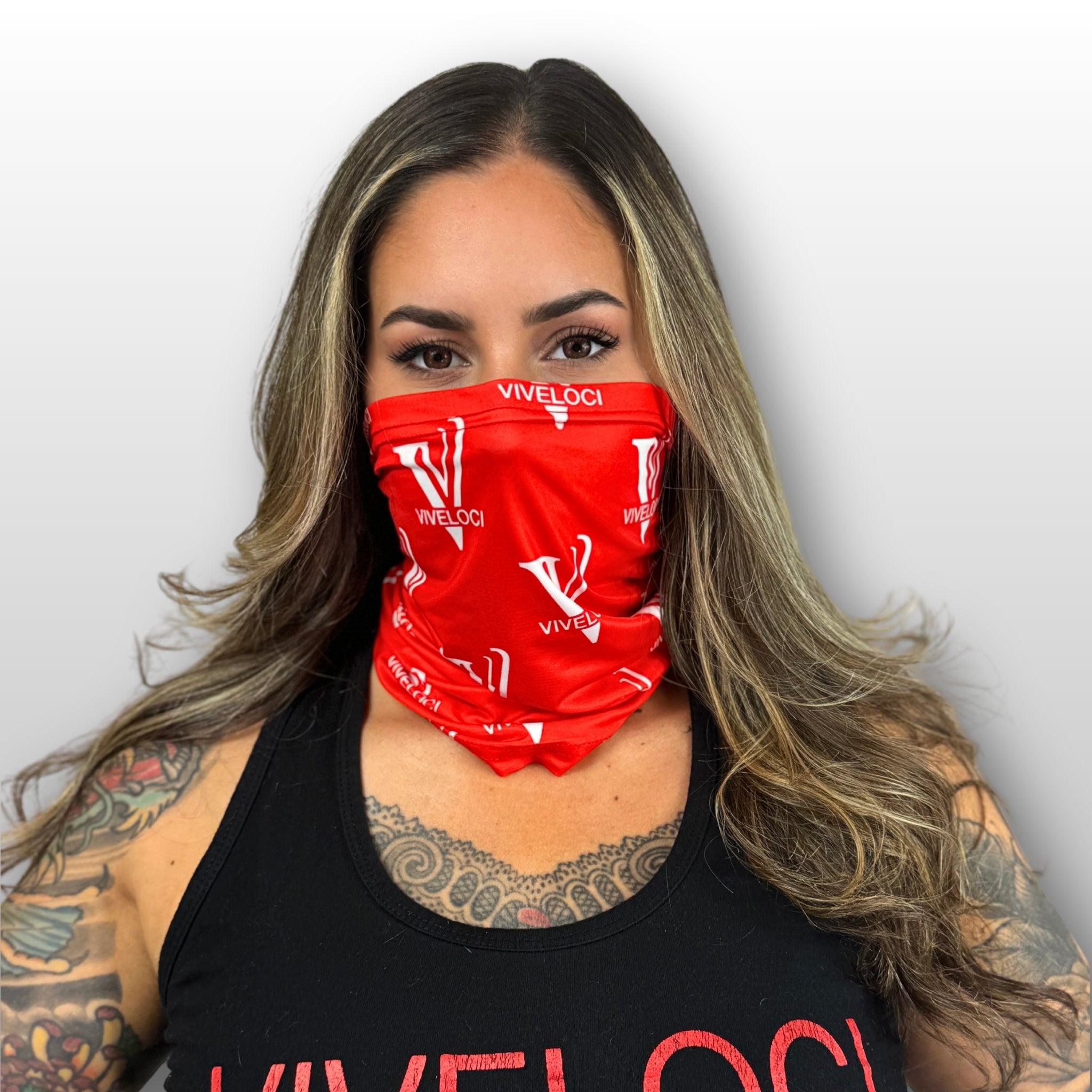Nina wearing a red Viveloci neck gaiter 