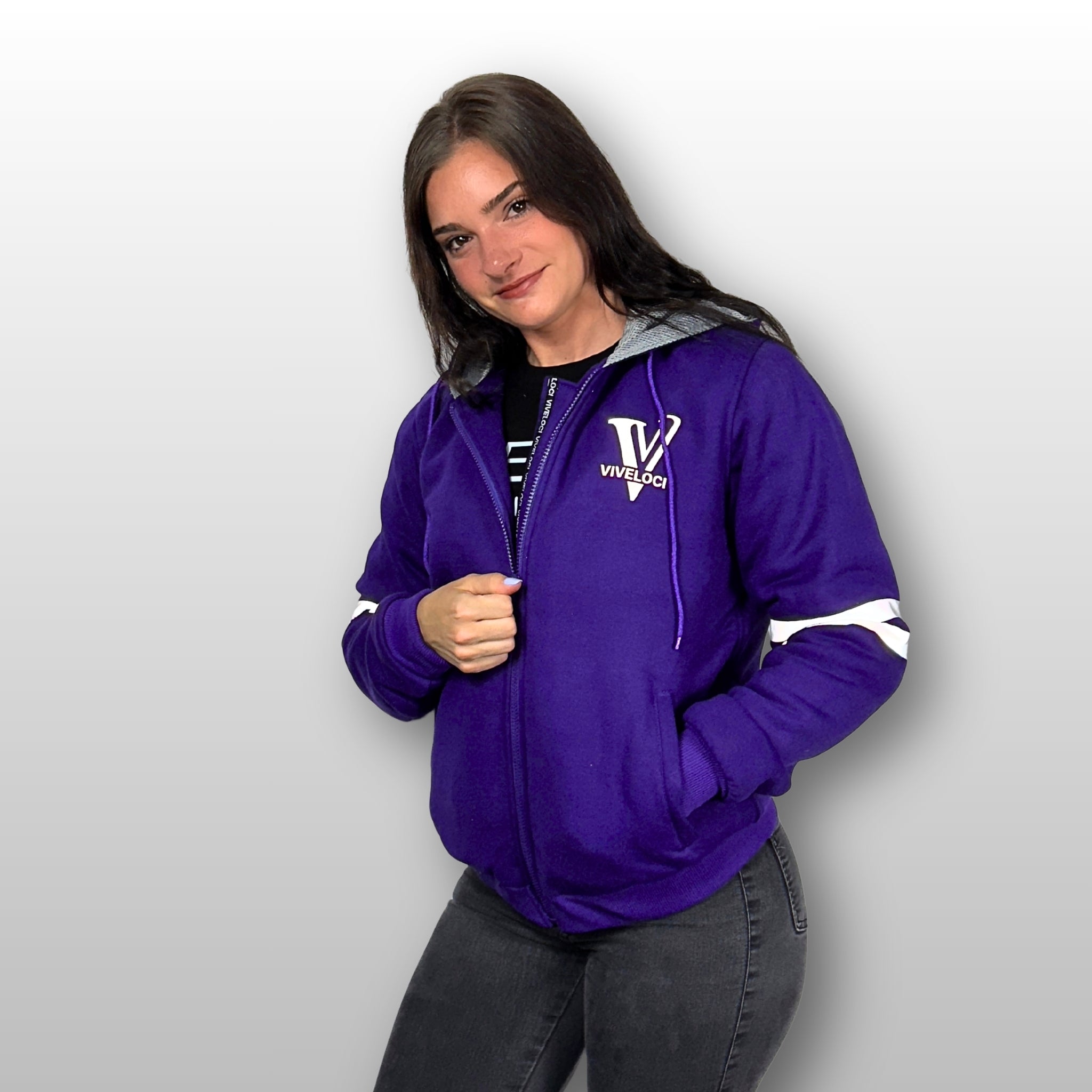 Kendra wearing Viveloci Women's Kevlar Lined, Armored, Motorcycle Hoodie in Purple.  Reflective back, front and arm bands.  Removable CE Level 1 Armor in Shoulders, Elbows and Back. Two zippered pockets on the outside and one on the inside. 