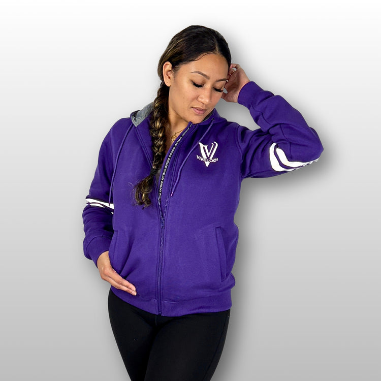 Lani wearing Viveloci Women's Kevlar Lined, Armored, Motorcycle Hoodie in Purple.  Reflective back, front and arm bands.  Removable CE Level 1 Armor in Shoulders, Elbows and Back. Two zippered pockets on the outside and one on the inside. 