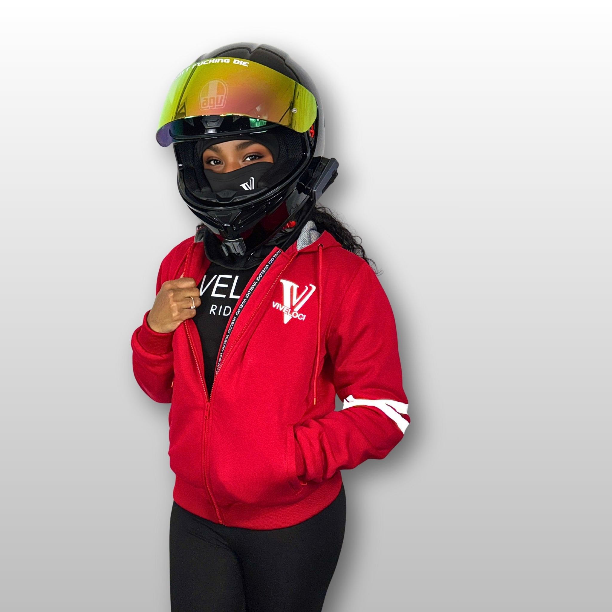 Aaliyah is wearing a ViVeloci Kevlar Lined, Armored, Motorcycle Hoodie in Red.  Reflective back, front and arm bands.  Removable CE Level 1 Armor in Shoulders, Elbows and Back. Two zippered pockets on the outside and one on the inside.