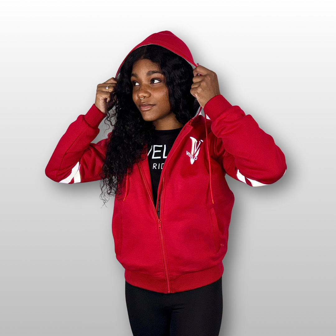 Aaliyah is wearing a ViVeloci Kevlar Lined, Armored, Motorcycle Hoodie in Red.  Reflective back, front and arm bands.  Removable CE Level 1 Armor in Shoulders, Elbows and Back. Two zippered pockets on the outside and one on the inside.