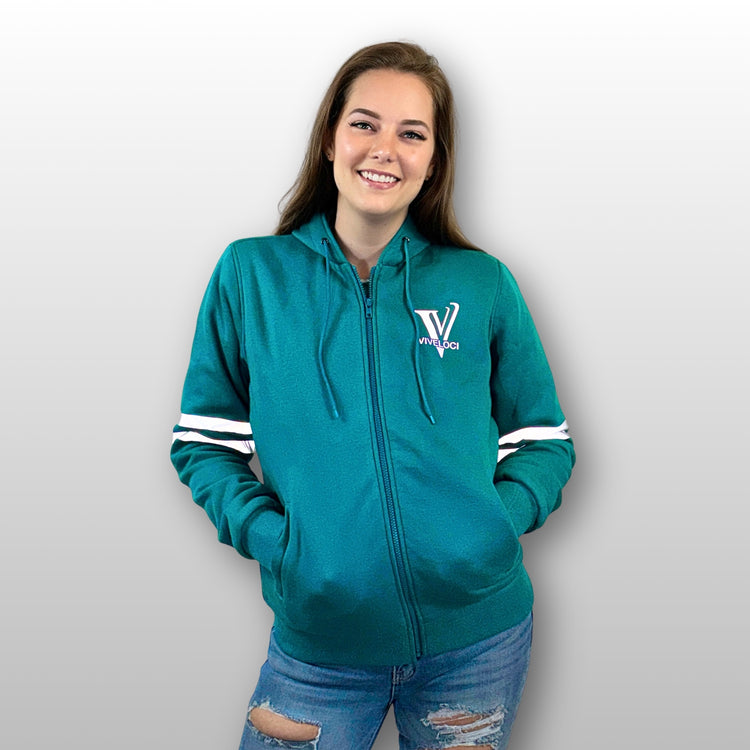 Blair is wearing a ViVeloci Kevlar Lined, Armored, Motorcycle Hoodie in Teal.  Reflective back, front and arm bands.  Removable CE Level 1 Armor in Shoulders, Elbows and Back. Two zippered pockets on the outside and one on the inside.