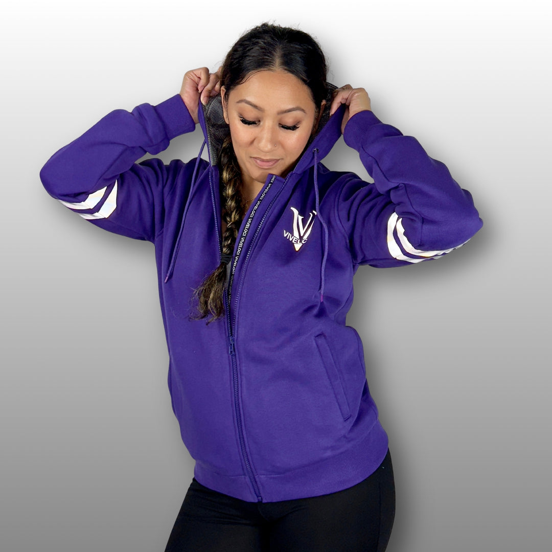 Lani wearing Viveloci Women's Kevlar Lined, Armored, Motorcycle Hoodie in Purple.  Reflective back, front and arm bands.  Removable CE Level 1 Armor in Shoulders, Elbows and Back. Two zippered pockets on the outside and one on the inside. 