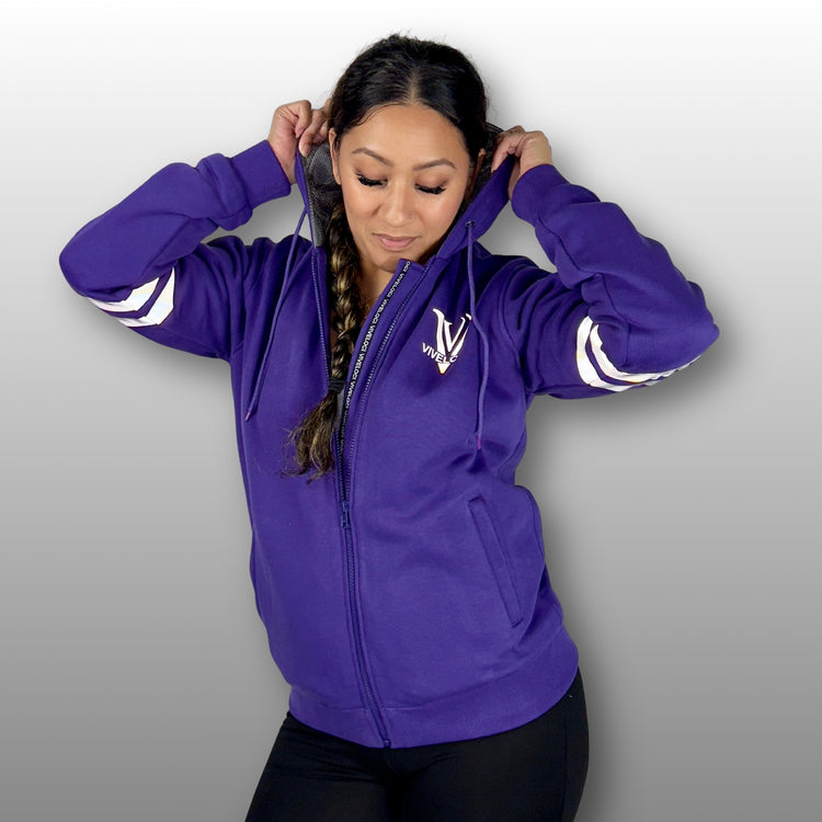 Lani wearing Viveloci Women's Kevlar Lined, Armored, Motorcycle Hoodie in Purple.  Reflective back, front and arm bands.  Removable CE Level 1 Armor in Shoulders, Elbows and Back. Two zippered pockets on the outside and one on the inside. 