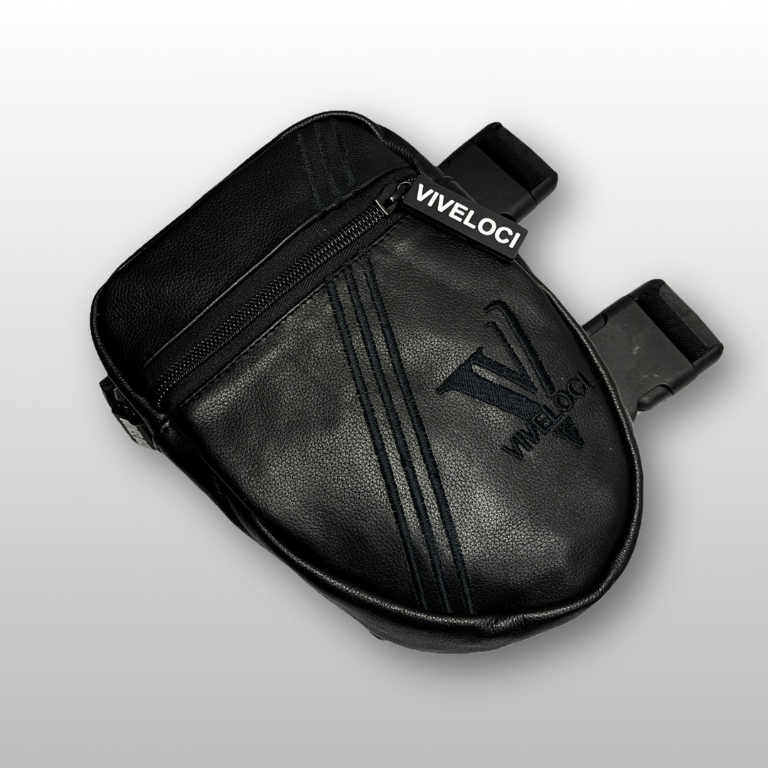 Black leather thigh bag with 'Viveloci' branding on a light gray background