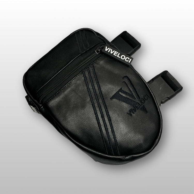 Black leather thigh bag with 'Viveloci' branding on a light gray background