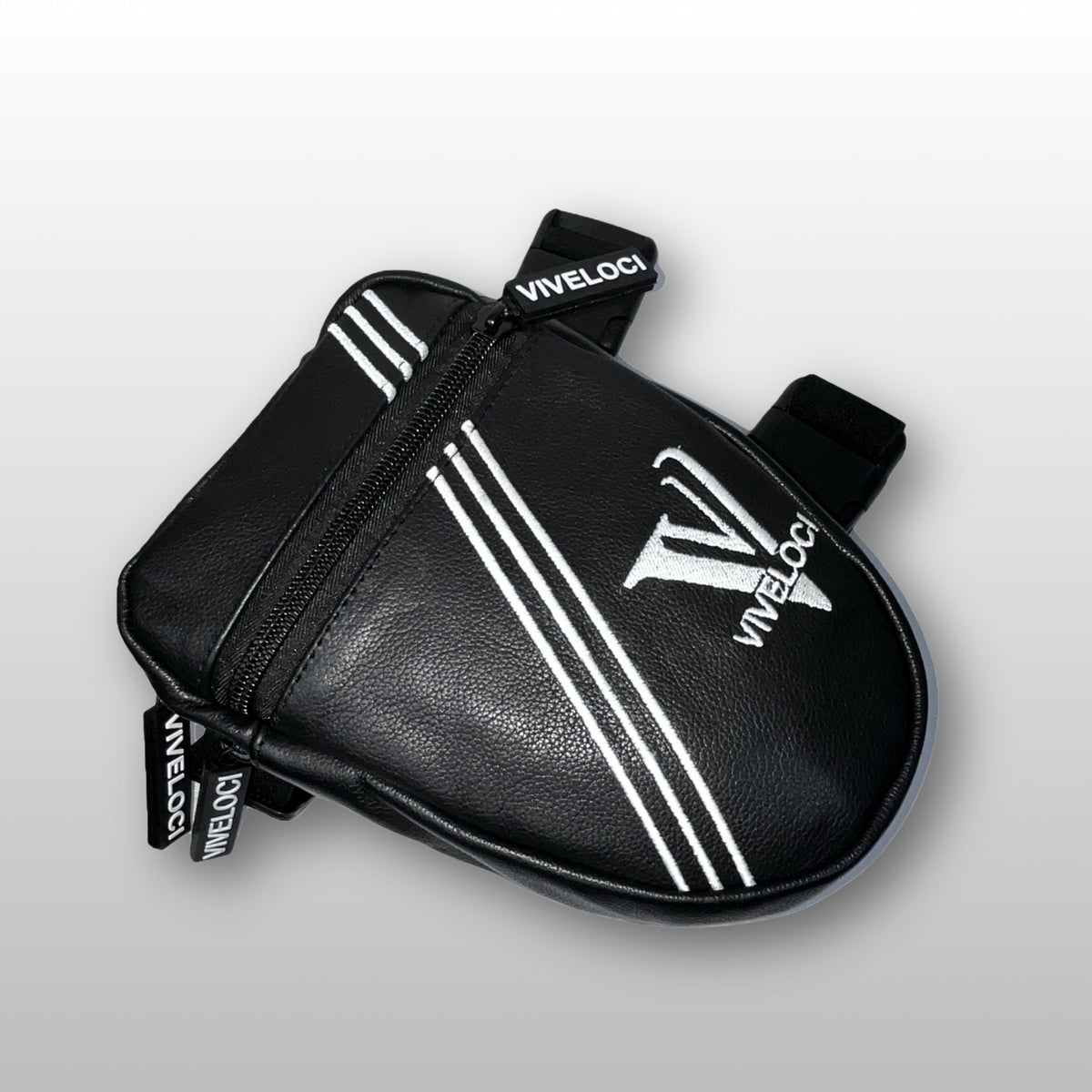Black leather thigh bag with white stripes and 'ViVeloci' branding on a light gray background