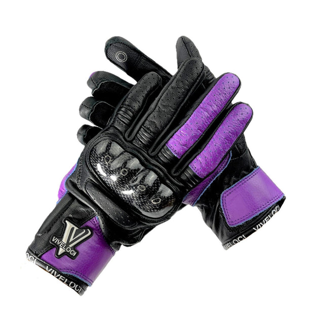  Ciao Bella Women’s Gloves in purple constructed with premium cowhide leather. Our half-gauntlet glove, specifically designed for a woman’s hand, has a 1 ¼ inch leather wrist cuff with a Velcro closure that fits over your jacket sleeve and stays secure. Carbon fiber knuckle protection and reinforced padding are on the palm. Touch-screen functionality on thumb and forefinger.