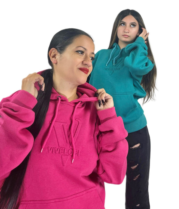 Rose and Angela wearing Hot Pink and Teal 3D logo hoodies
